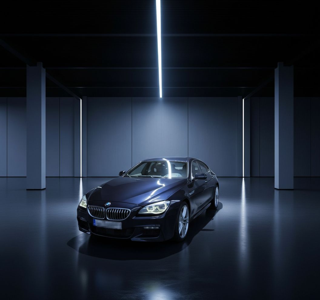 After AI enhancement - BMW in professional showroom studio with dramatic lighting